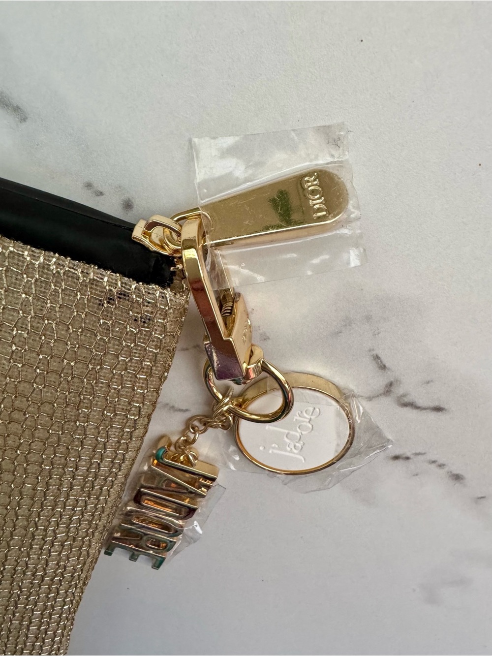 Dior Gold Metallic cosmetic pouch with matching keychain